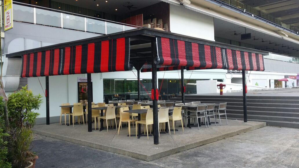 Red and Black Bamboo Blinds at an outdoor cafeteria