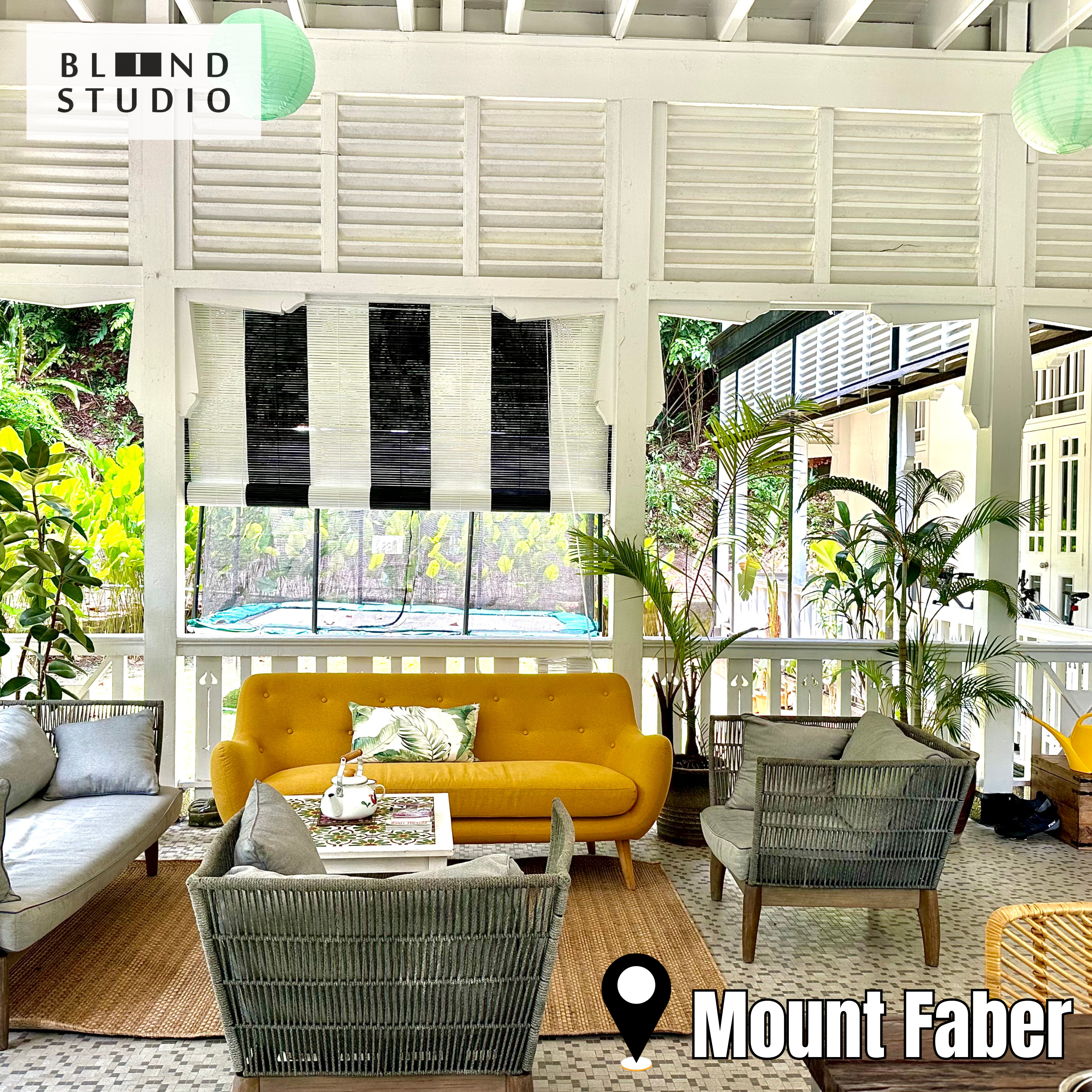 Black and white bamboo blinds with havana style interior design, yellow sofa, small house palm. Best for colonial house