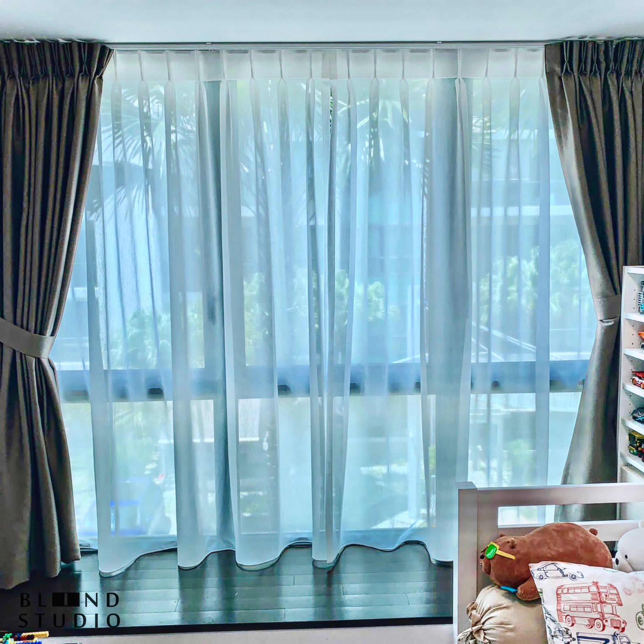 Sheer White Translucent day curtain and grey night Curtain in a kids bedroom